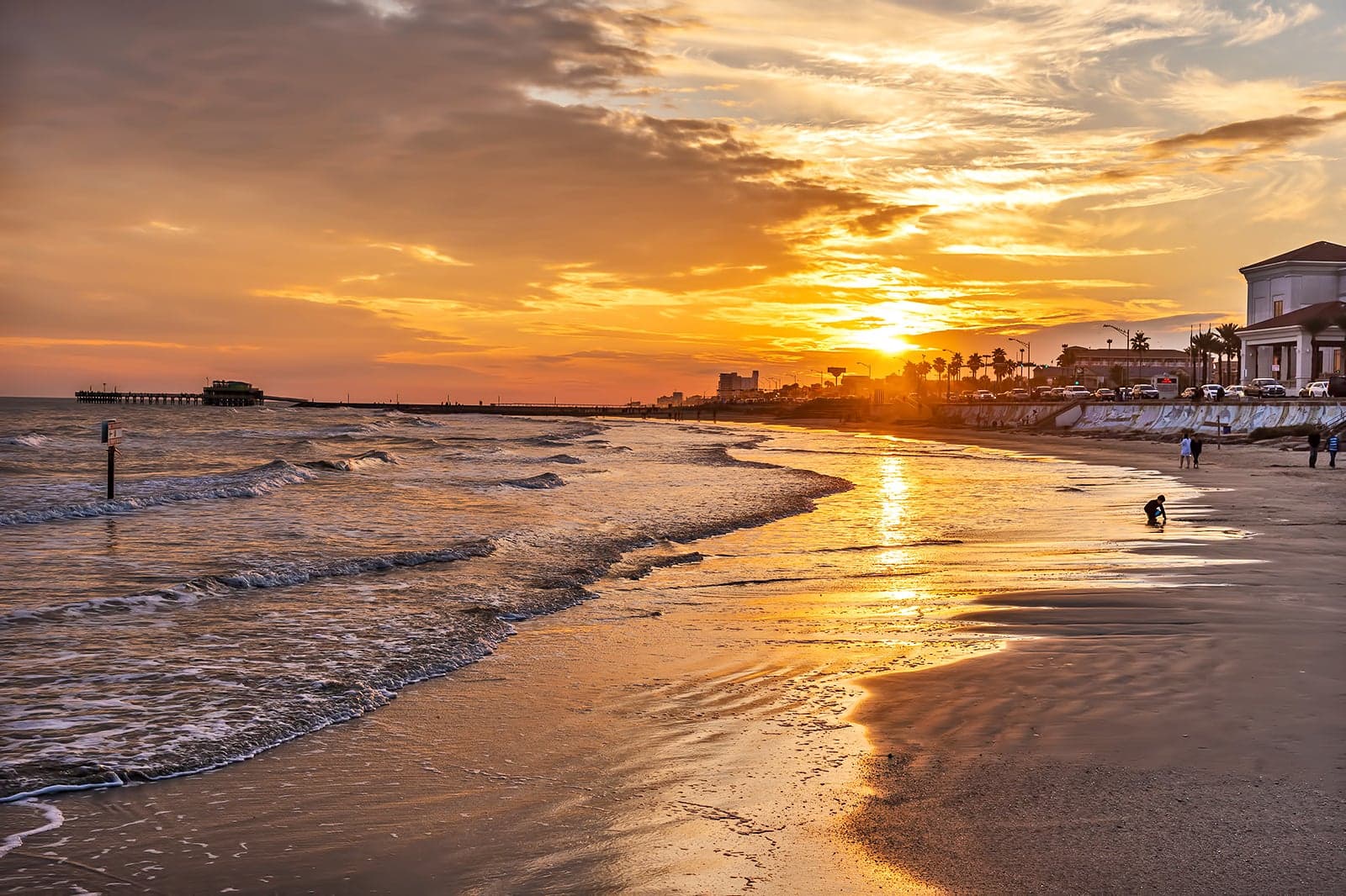 Sunset over a Gulf Coast beach and pier
